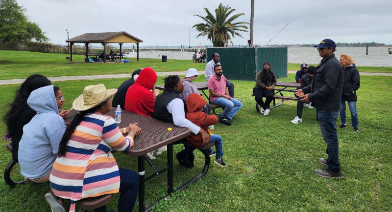 People Engaged in Bible Study Outside